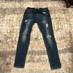 Blue ripped skinny jeans